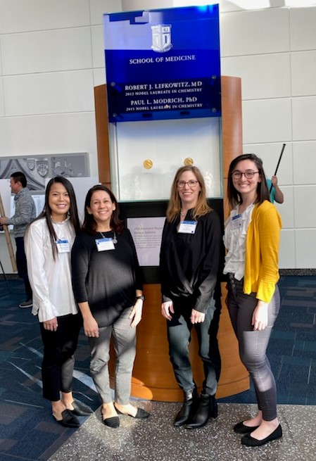 Dr. Adamson with lab group at Duke