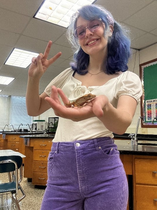 Alex Nolan stands in her science classroom at East Forsyth High School. 