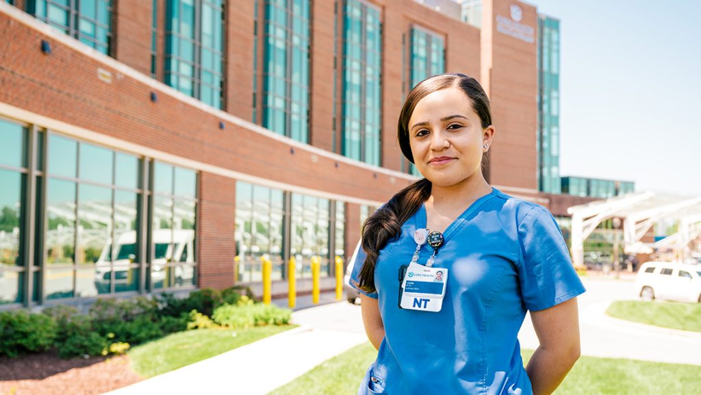 nurse Diana Moreno standing in front of Cone Hospital